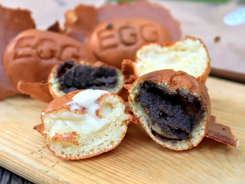 台南雞蛋糕／每日限量晚來吃不到／當天現打新鮮麵糊不用預拌粉／純手工熬煮內餡／不添加香精香料／百分百純鮮奶製作／不定期推出隱藏版口味