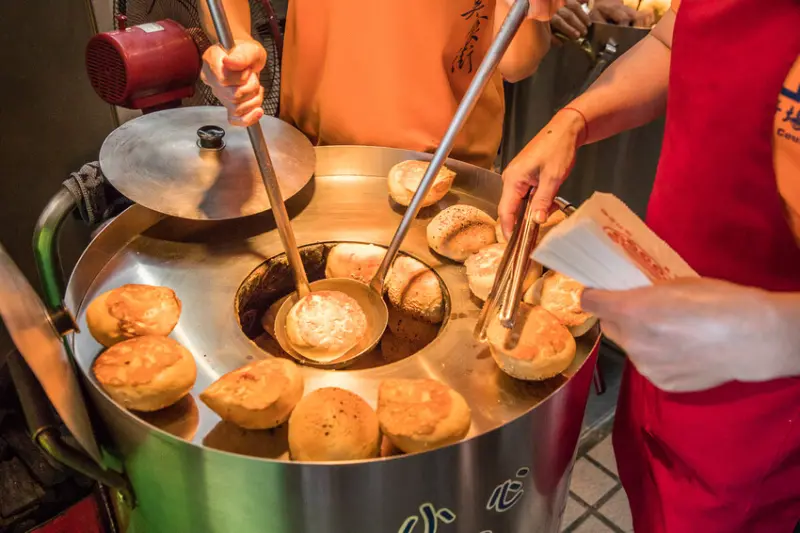 新北市瑞芳區還沒出爐就被訂光？老麵溫體豬炭烤好吃胡椒餅