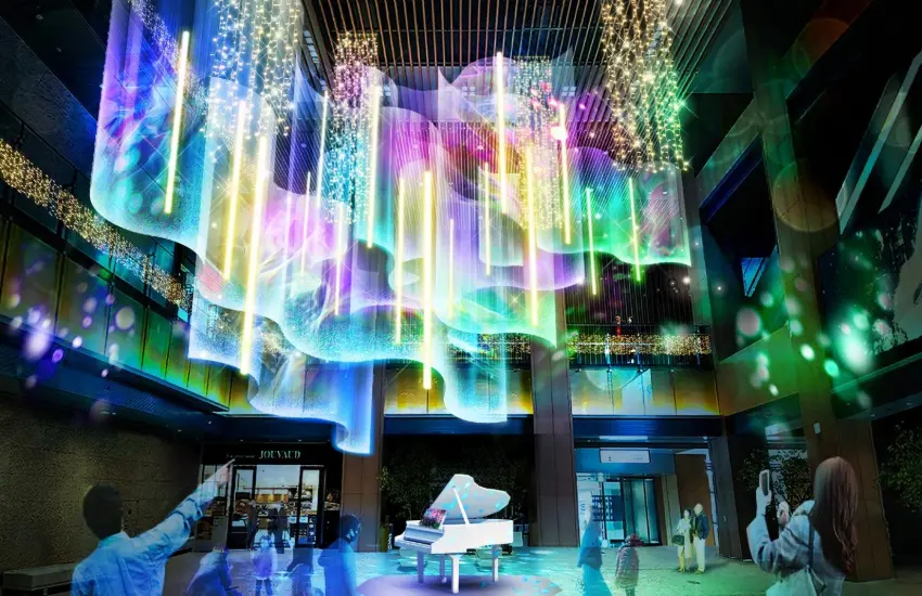 ▲透過先進的AI音樂辨識系統,每個人演奏的旋律都能轉化為專屬的色彩組合,在巨大的極光裝置上即時呈現。