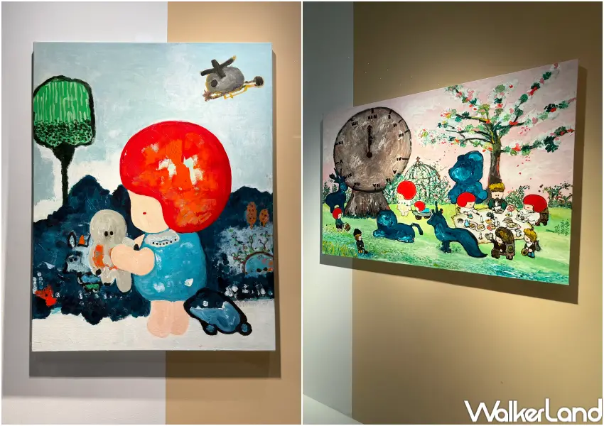 ▲信義區展覽在全豐盛105大樓一樓櫥窗展區，展出藝術家寧芮潔紅髮女孩系列畫作。(攝影：鄭亦庭)