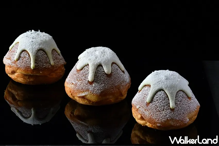 ▲外型如同被白雪覆蓋的「富士山生泡芙」,結合了酥脆泡芙、費南雪與法式布蕾三種口感,圖為首波推出的口味之一