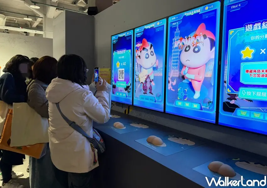 ▲華山蠟筆小新展互動遊戲！可以拍打小新屁屁闖關玩遊戲。(攝影：鄭亦庭)