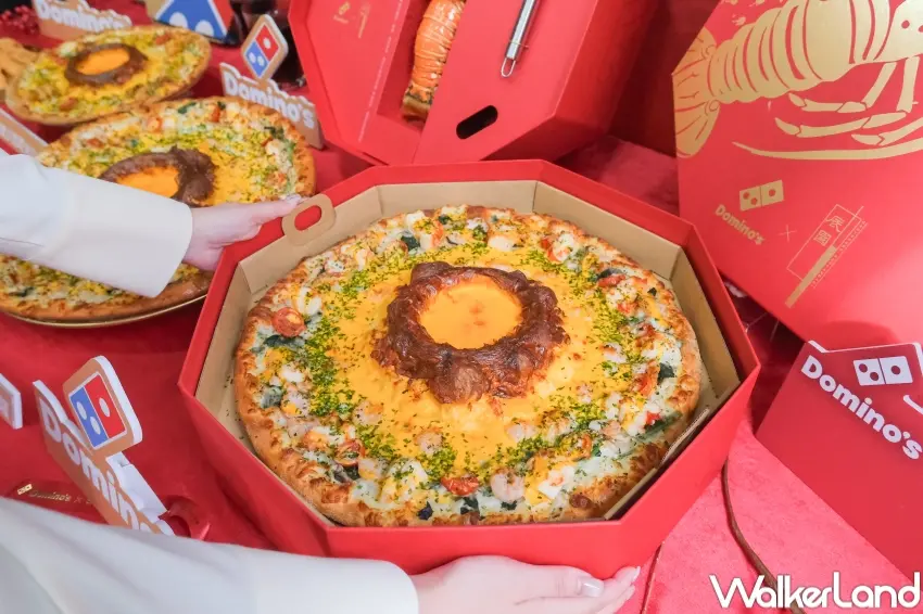▲達美樂以金沙起司火山為核心，打造新年期間多款節慶限定披薩，主打團聚共享情境。（攝影：張人尹）