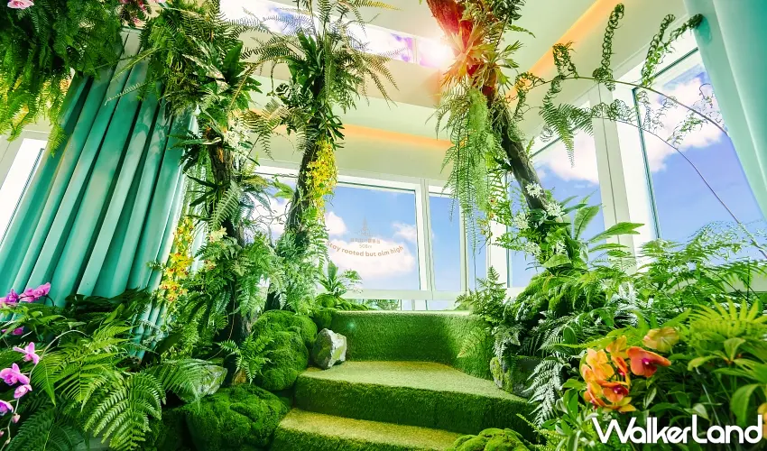 ▲特展中央的「雲朵仙境」裝置,以2026年度趨勢色「雲舞白」與「變革綠」打造,讓旅客在508公尺高空也能感受置身雲端的夢幻氛圍 。圖/台北101提供;窩客島整理