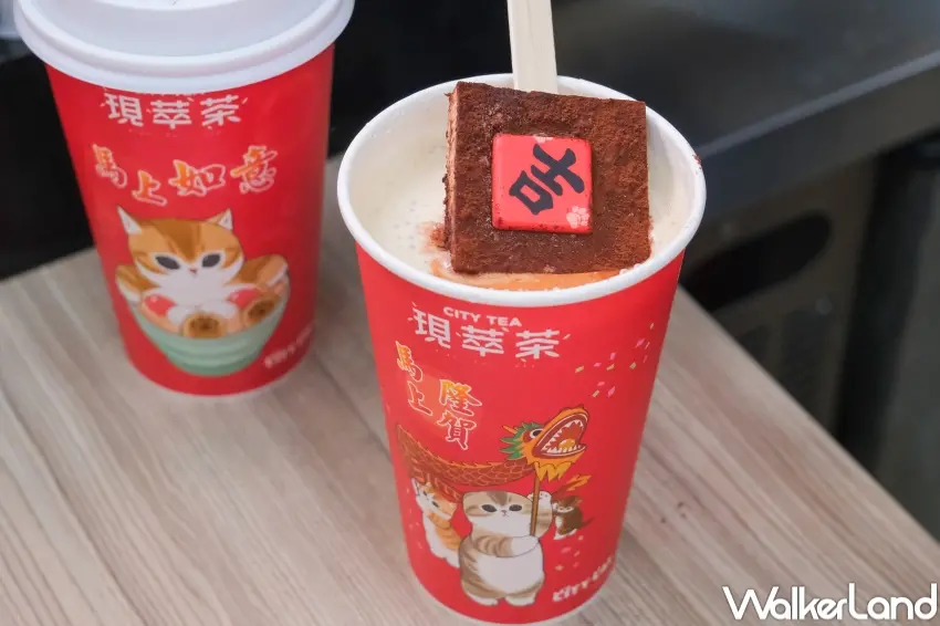 ▲7-11 推出喵財進寶提拉米蘇風味奶茶,奶茶結合白巧克力提拉米蘇蛋糕,成為貓之日限定話題飲品。(攝影:張人尹)