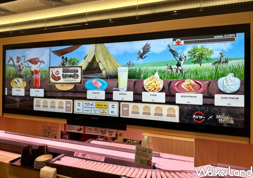 ▲壽司郎更跨界聯名《魔物獵人 荒野》，在微風南山店推出期間限定點餐模式，讓可愛的艾路貓陪伴大家用餐。
