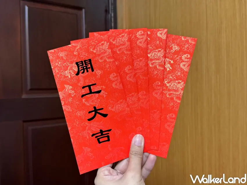 ▲老闆要在開工日發開工紅包,分享喜氣聚財氣。(攝影:張人尹)