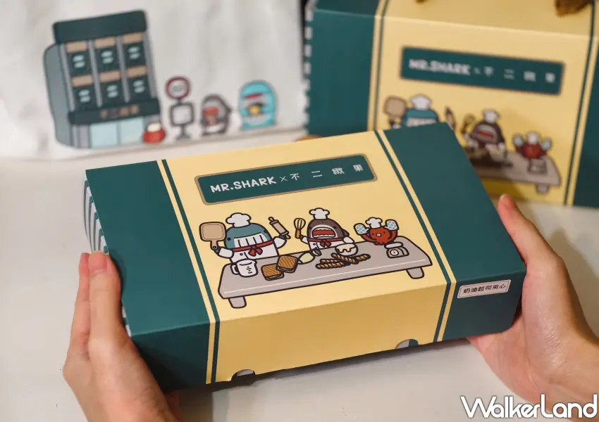 ▲高雄伴手禮名店「不二緻果」跨界聯名，與超萌插畫鯊魚先生攜手推出限量甜點禮盒。(攝影：鄭雅之)