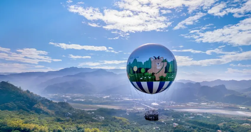 南投九九峰園區3/9試營運！全台唯一168公尺高空氦氣球，試營運全票99元與早鳥預約免費入園攻略。