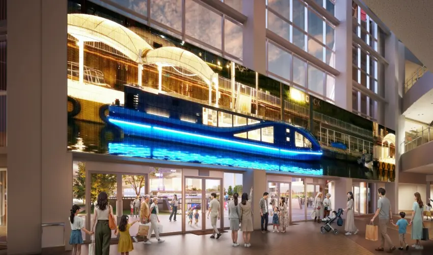 ▲柱面與牆面合計設置27面數位看板,未來旅客可以在美食區直接觀賽。