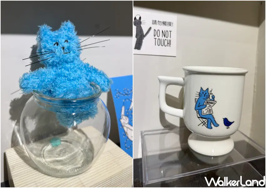▲Sachiket台北個展推出的藍色貓貓毛絨掛飾、貓貓馬克杯等周邊商品。(攝影：鄭亦庭)