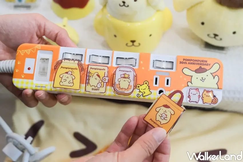 ▲三麗鷗布丁狗在7-ELEVEN集點活動中推出購物袋與電源線組等配件，讓粉絲在通勤與日常使用都能融入角色元素。（攝影：張人尹）