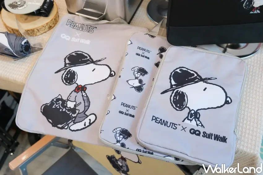 ▲7-ELEVEN史努比推出旅行收納袋摺疊露營椅等戶外用品，主打輕巧收納與實用機能。（攝影：張人尹）