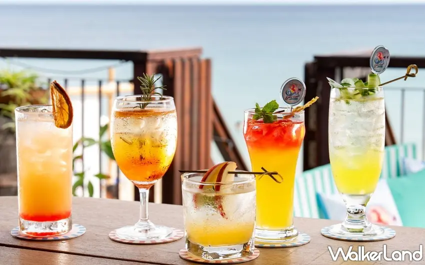 ▲小灣酒吧期間限定菜單，從酥炸鮭魚主餐到沁涼果香飲品、風格調酒到造型冰棒，將夏日風味轉化為兼具風格與感官的餐飲體驗 。 圖／墾丁凱撒提供；窩客島編輯李維唐整理
