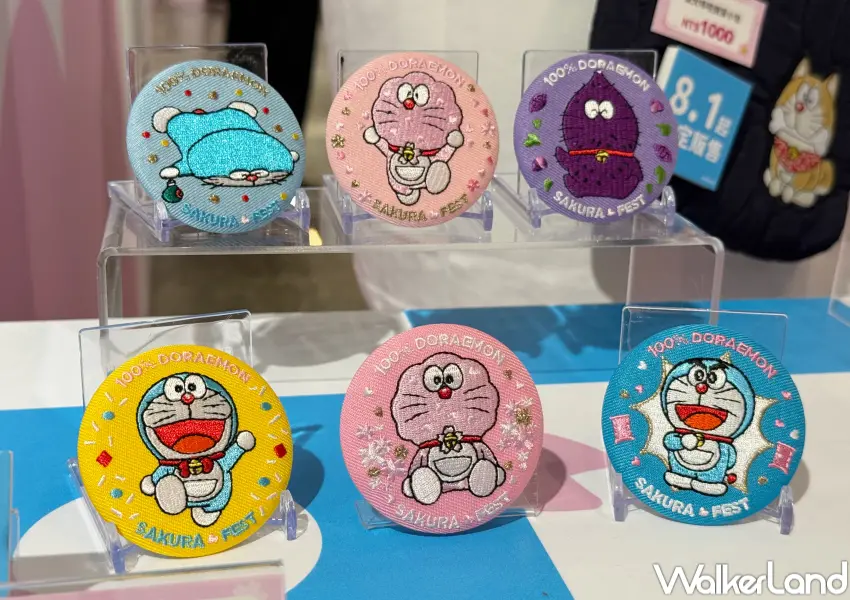 ▲松菸哆啦A夢櫻花節28款周邊新品！哆啦A夢扭蛋刺繽徽章全6款，9/5起限定販售。(攝影：鄭亦庭)