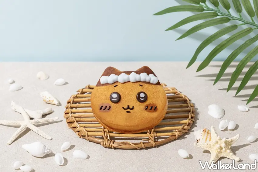 ▲限定款「ハチワレパン(花かんむり)」,戴著淺藍色花圈的小八貓麵包,裡面填滿了濃香巧克力醬。圖/吉伊卡哇麵包店提供;窩客島編輯李維唐整理