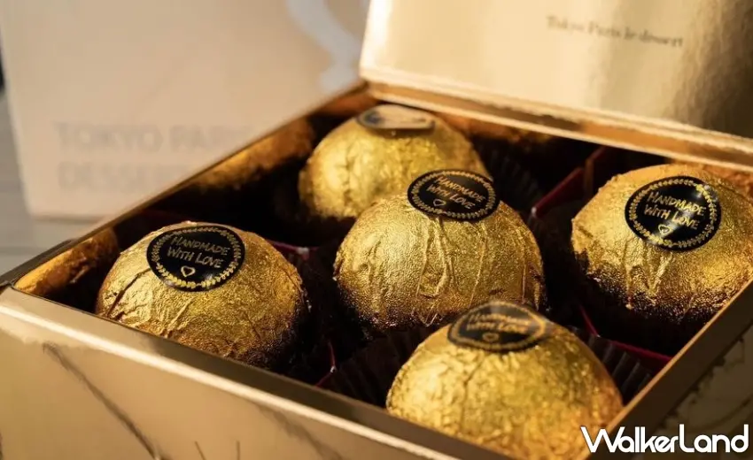 ▲金莎菠蘿蛋黃酥每顆均以亮眼金色鋁箔單獨包裝，猶如耀眼的黃金寶石。圖／東京巴黎甜點提供；窩客島編輯李維唐整理