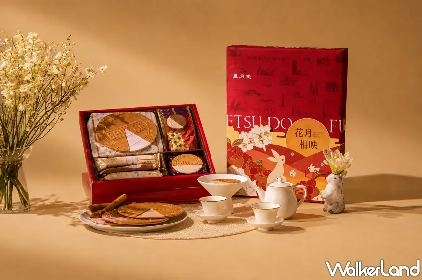 ▲神戶風月堂台灣限定花月相映中秋緋紅綜合禮盒，擺設經典法蘭酥與精緻烤餅，呈現溫暖質感氛圍。圖／神戶風月堂提供；窩客島編輯李維唐整理