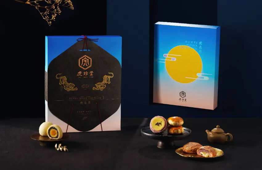 ▲以中秋圓月結合品牌圖騰,設計出專屬虎尾的月光意象。黑底配上金色袖套,展現高級質感。
