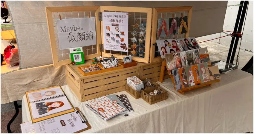 ▲「綠生活市集」集結多元文創品牌與特色美食,包括專注圖文創作與似顏繪的插畫家「Maybe。或許」。