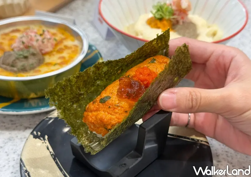 ▲爭鮮聯名黑白大廚鄭鎬泳推出鮟鱇魚肝握握卷,濃郁魚肝搭配特製辣醬蘿蔔泥,口感層次豐富。(攝影:鄭雅之)