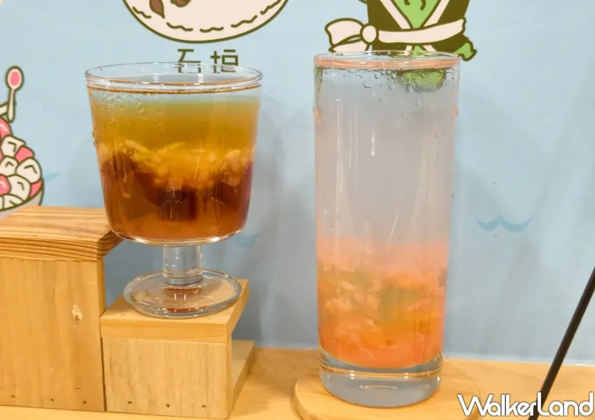 ▲一沐日聯名台灣虎航推出虎米Q桃粉粿蜜桃香茶與虎蜜荔枝牡丹蜜桃飲兩款果香手搖,單杯售價皆為90元。(攝影:鄭雅之)