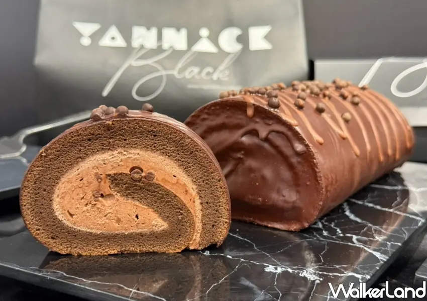 ▲BLACK黑饌80%喀麥隆脆皮黑巧克力生乳捲,外層裹上脆皮皮膜與巧克力脆球交織雙重奶霜口感。(攝影:鄭亦庭)