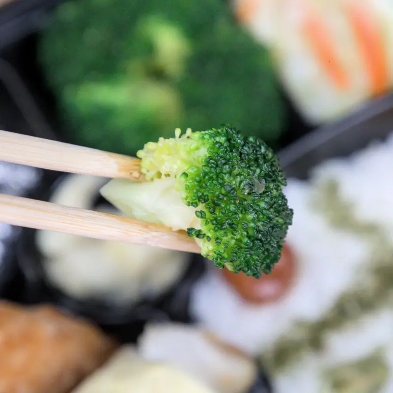 紅蕃茄便當的台灣高山尖頭高麗菜近照，口感清脆香甜，用料實在，是便當美味的關鍵配菜之一。