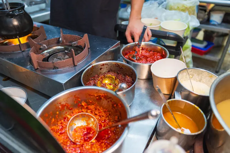 川麵道北平店｜台中正宗四川味罐罐米線，7種特調湯頭獨特泡椒辛香料陶罐燉煮砂鍋，一吃上癮的台中北屯美食推薦