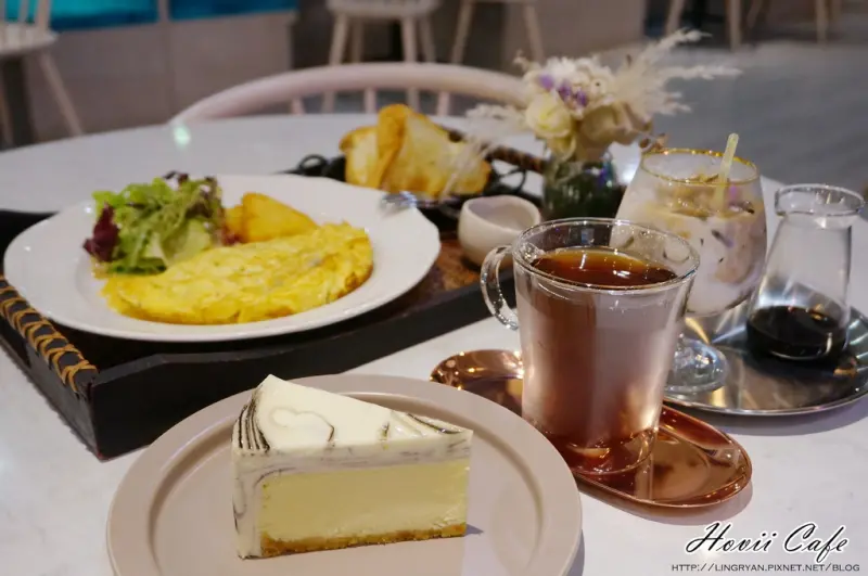 高雄。新興｜Hovii Cafe-紫色浪漫紫藤花海、綠葉拍照網美牆；網美必拍下午茶IG夢幻打卡餐廳-高雄福華飯店小清新質感約會咖啡廳