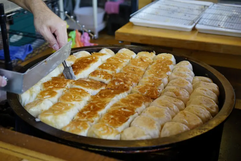 台南｜棠口純豆漿、水煎包(海安本部) 人氣高麗菜水煎包推薦！ - 奇奇一起玩樂趣