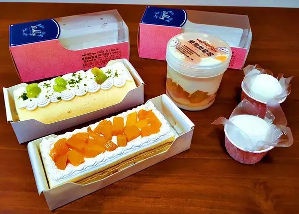 台中市北屯區[威利與查理手作烘焙坊]方便食用的芒果罐罐 口感多層次~芒果大福包有蛋糕 芒果和生乳 超夢幻~芒果生乳捲&檸檬芒果蛋糕多重口感好吃