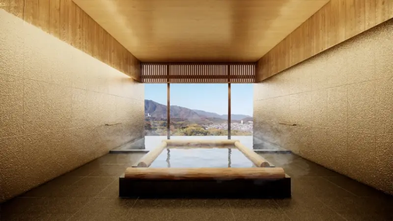 ▲室內溫泉能欣賞連綿山景,還貼心地設置兩種不同溫度的浴池。