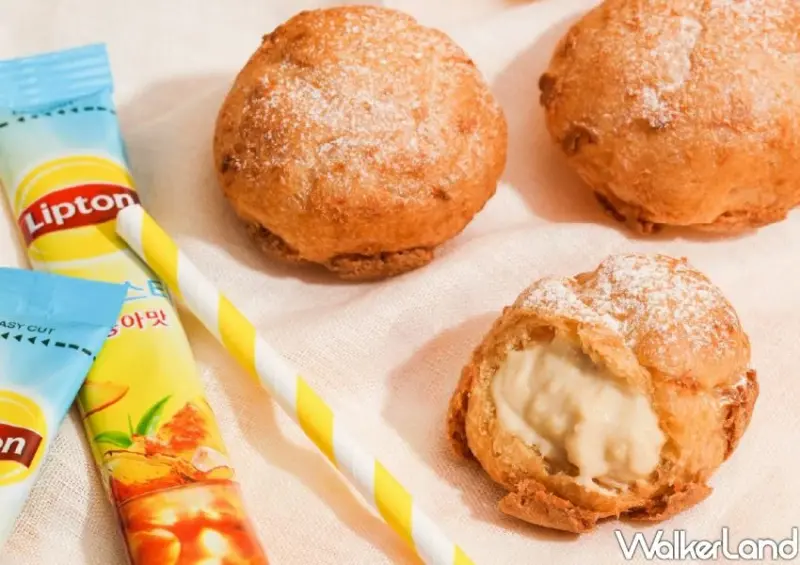 雙連站甜點快閃！爺爺泡芙Ｘ立頓聯名蜜桃泡芙，全新水蜜桃果粒加滿。